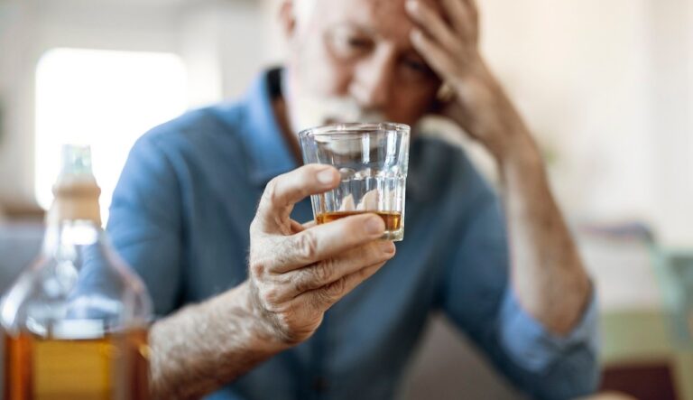 man drinking liquor